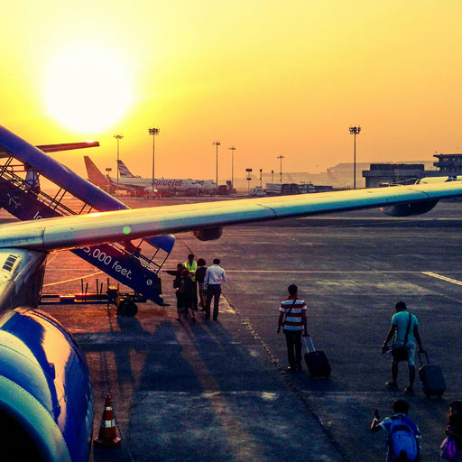 Passengers boarding a plane by Anugrah Lohiya: https://www.pexels.com/photo/photography-of-airplane-during-sunrise-723240/